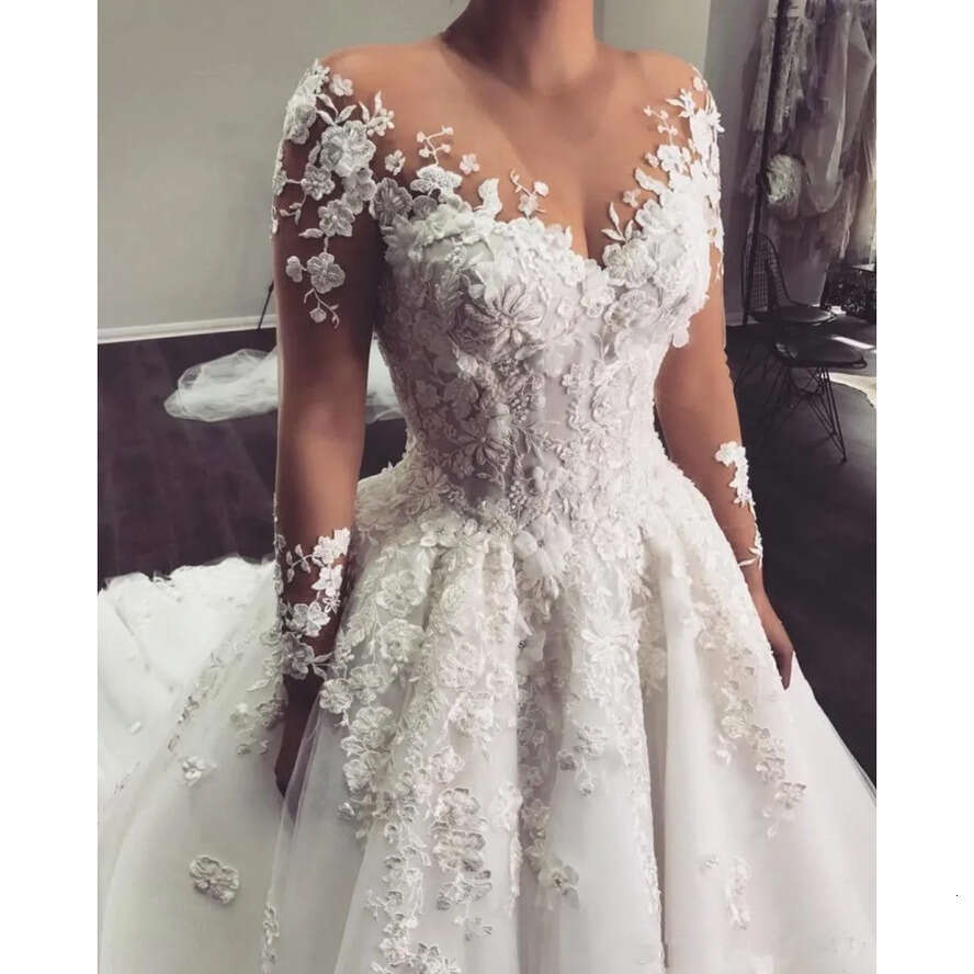 Elegant Lace A E Dresses Arabic Sheer Long Sleeves Tulle Applique 3D Ral Beaded Sweep Train Bridal Wedding Gowns With Buttons Bc3370