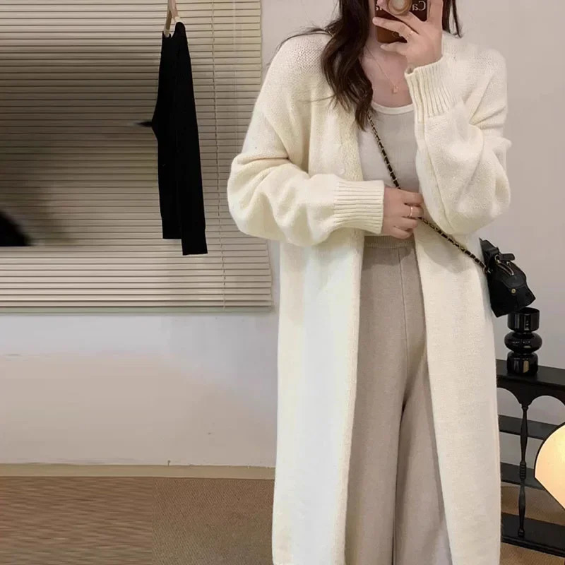 minimalist and versatile autumn long knitted cardigan for women with a lazy style over the knee Vneck thick sweater jacket 241112