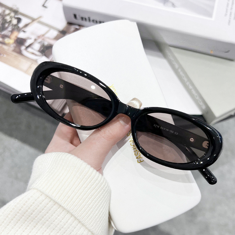 Men and women's new sunglasses women's senior sense small frame cat-eye sunglasses polarizing UV protection star sunglasses of the same type