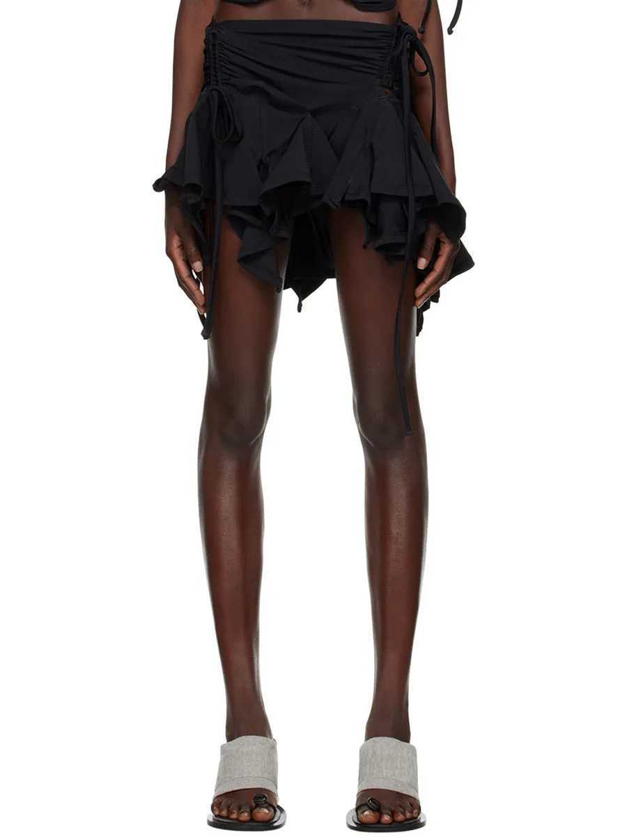 Skirts Irregular leather womens solid black beige brushed lace up pleated mini leather womens summer fashion short skirt Y240420