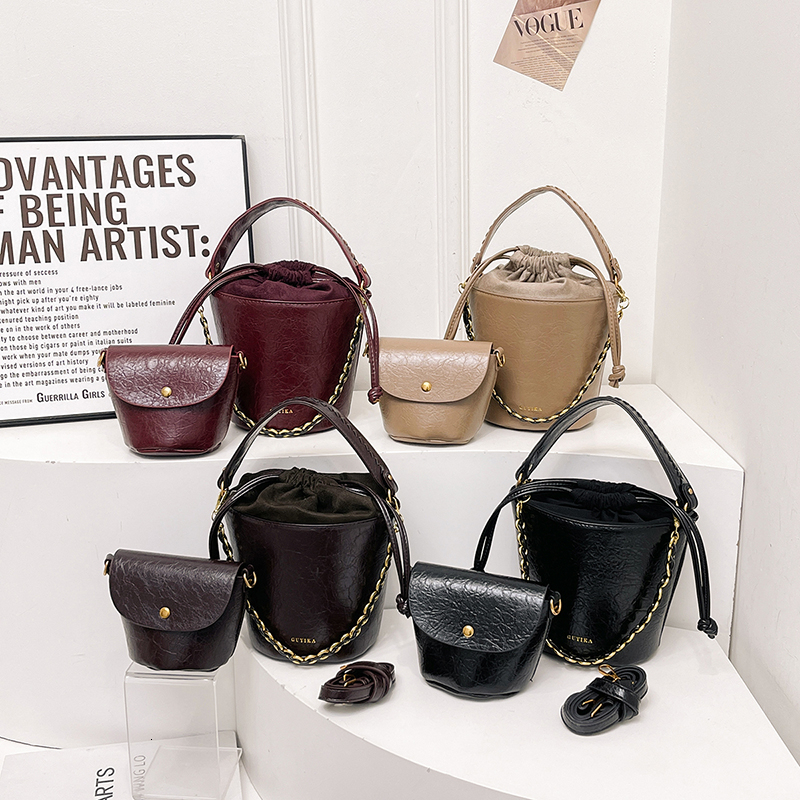 New MOODS Retro Women s Bucket leisure trend Crossbody Bag Oil Wax Leather IN Chain Shoulder Bag Designer Wallet and Handbag