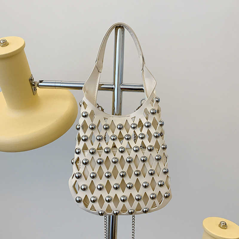 New Womens Bag with Hollowed Out Diamond Pattern Handbag Punk Style Round Rivet Tote Bags Trendy Crossbody Purses 241127