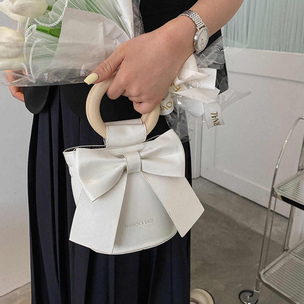 New Sweet Bow Designer Mini Shoulder leisure trend Leather Bucket Crossbody Bag Women s Fashion Brand Handbag Designer Women s Handbag