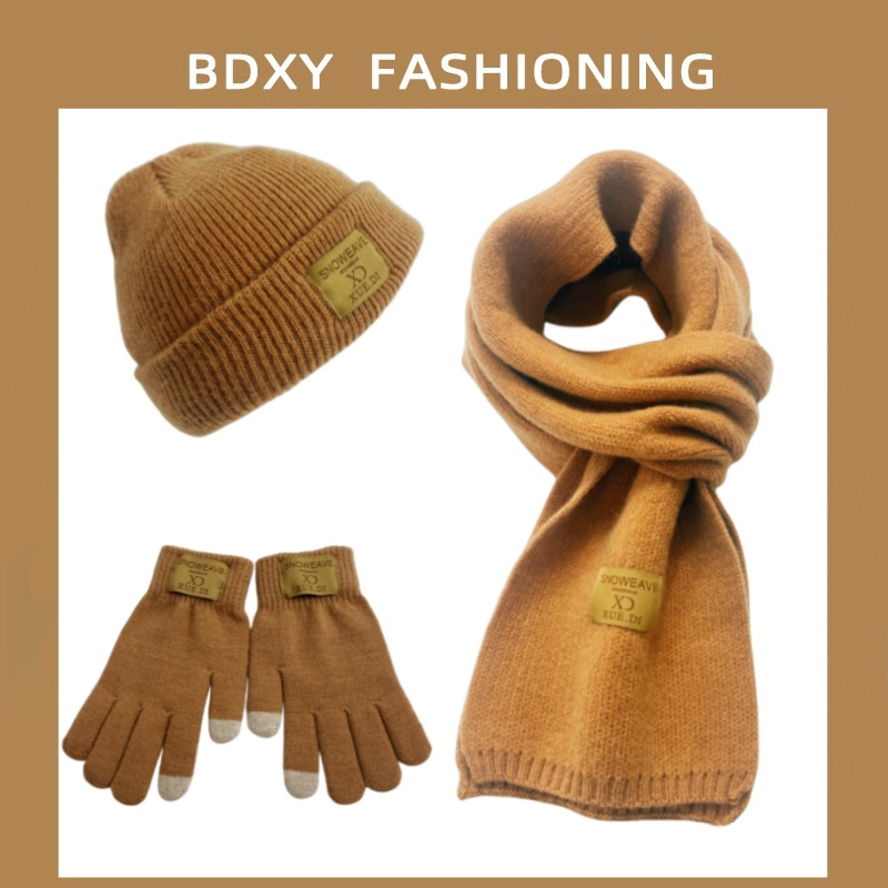 European and American autumn and winter women's knitted three piece set solid color warm and velvet yarn hat scarf glove set touch screen