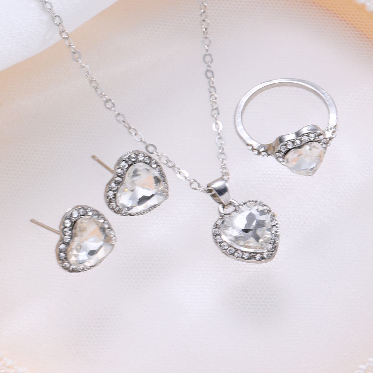 Cross-border new inlaid full of diamonds love zirconium necklace earrings ring set of three pieces of fashion high-class sense of jewelry