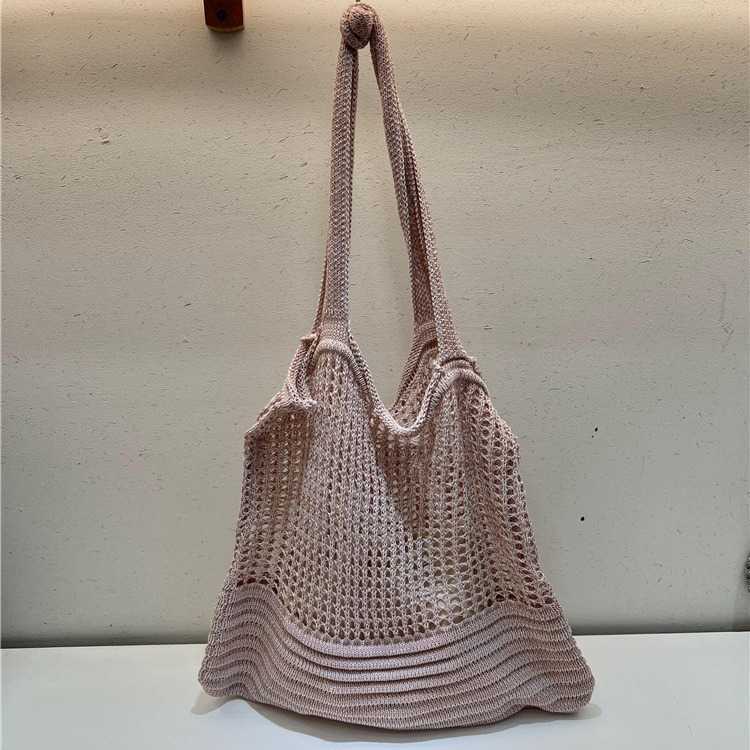 New niche design highend shoulder bag, armpit woven bag, women's autumn hollow hole knitted fabric bag