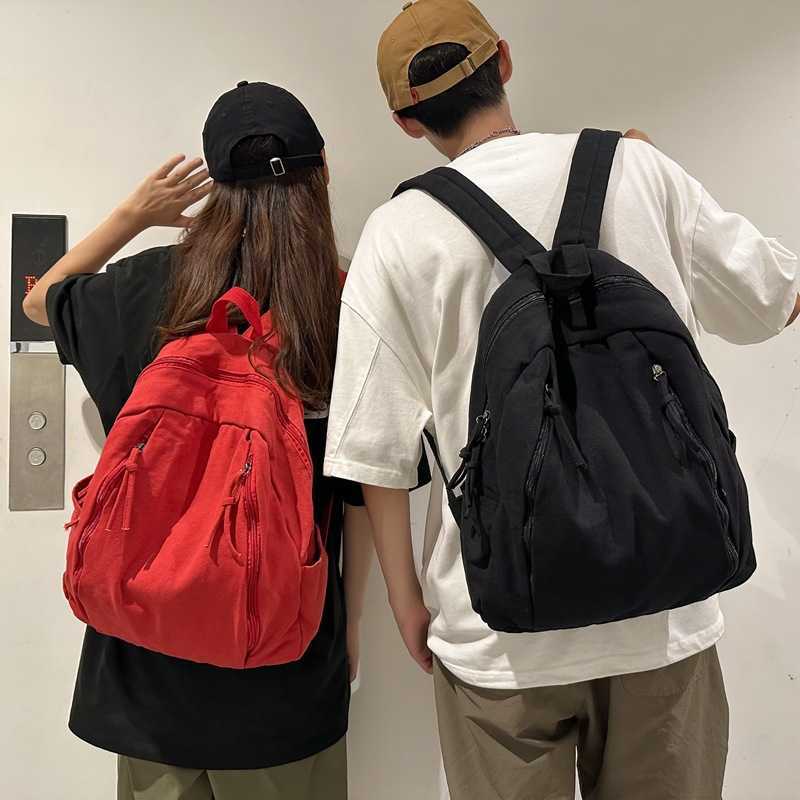 Korean casual niche canvas backpack 2024 new female fashion versatile student backpack simple and lightweight backpack