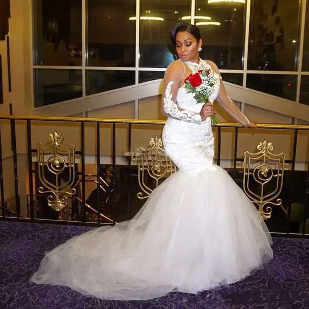 High African Plus Size Neck Wedding Dresses Lace Appliques Beads Sheer Long Sleeves Tulle Mermaid Bridal Gowns Vestidos De Noiva