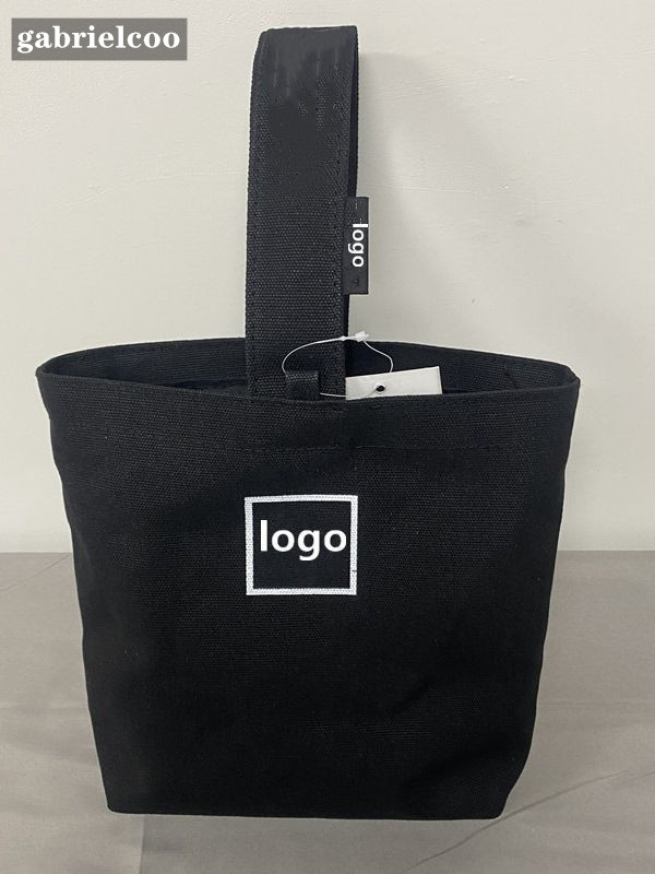 Designer black white women's canvas bag classic letter logo women's fashionable portable bag handbag bento bag travel shopping bag Bucket bag