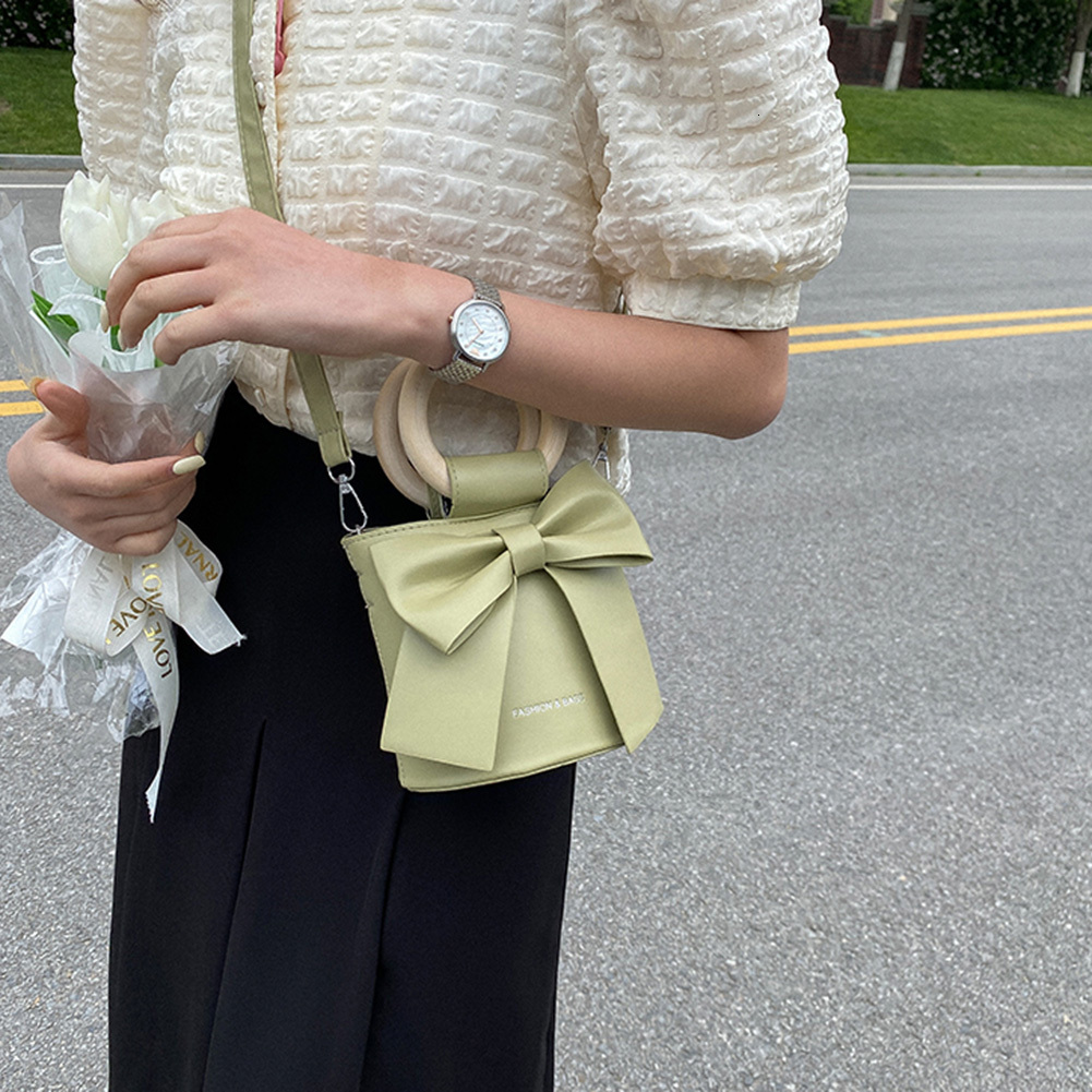 New Sweet Bow Designer Mini Shoulder leisure trend Leather Bucket Crossbody Bag Women s Fashion Brand Handbag Designer Women s Handbag