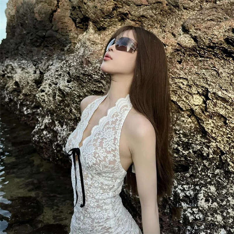 Wind 2024 autumn new women's clothing elegant white lace sleeveless top tassel slim fit short skirt