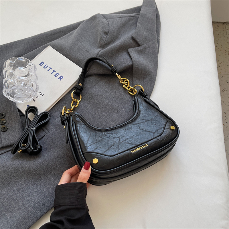 2024 new niche underarm spicy girl New style chain, single shoulder crossbody bag, women's fashionable texture dumpg bag