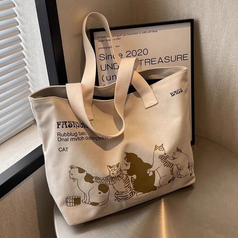 Large capacity canvas women in 2024, new single shoulder for mothers, student class tote bag