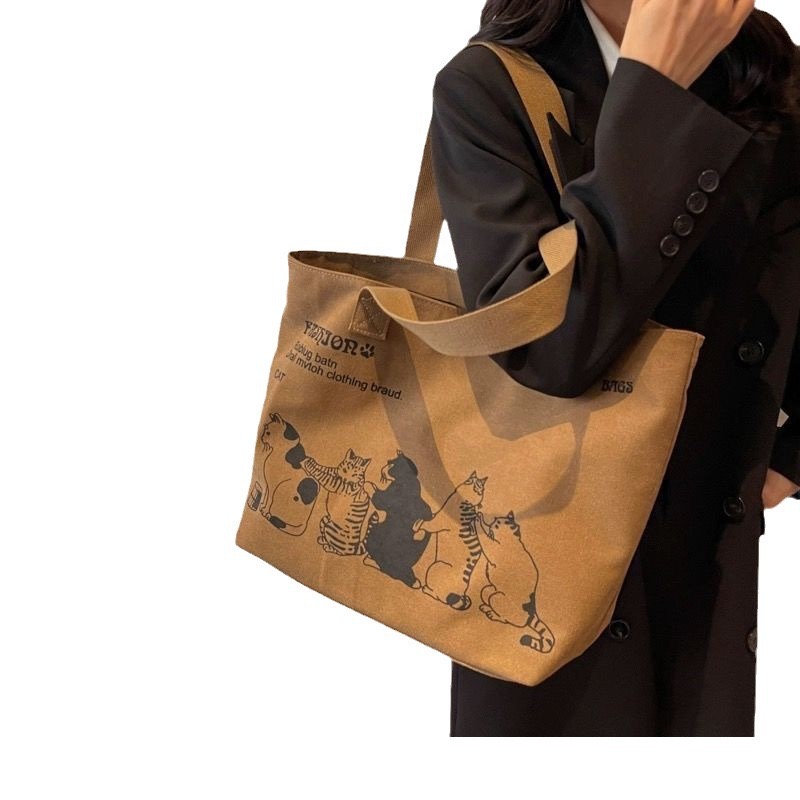 Large capacity canvas women in 2024, new single shoulder for mothers, student class tote bag