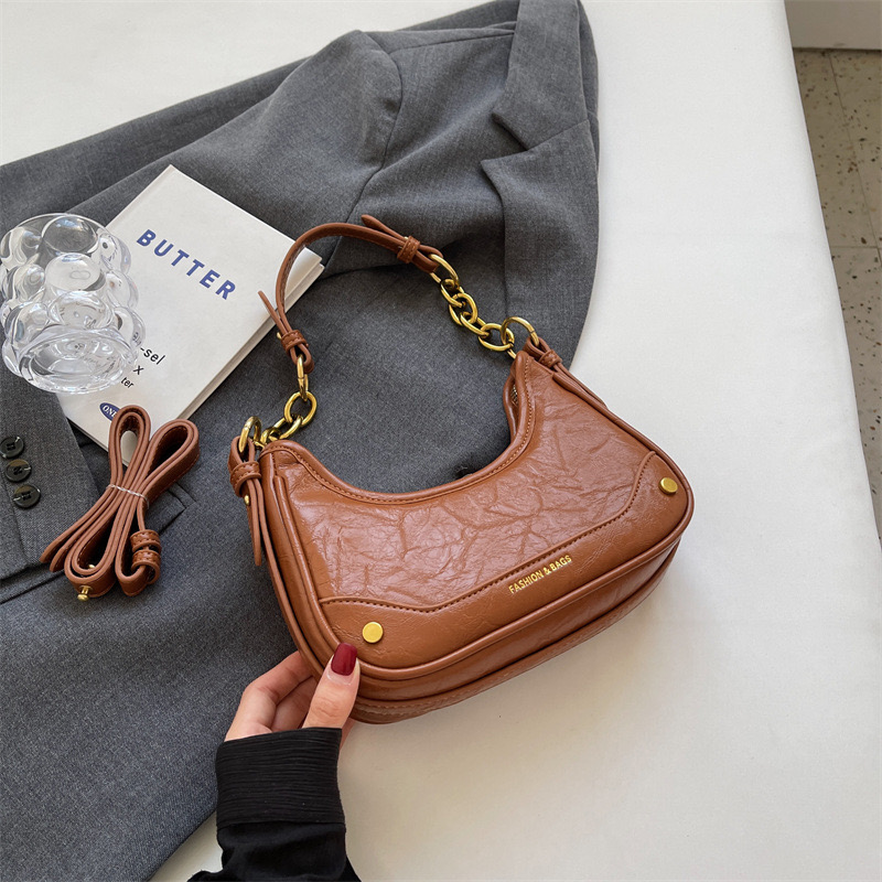 2024 new niche underarm spicy girl New style chain, single shoulder crossbody bag, women's fashionable texture dumpg bag