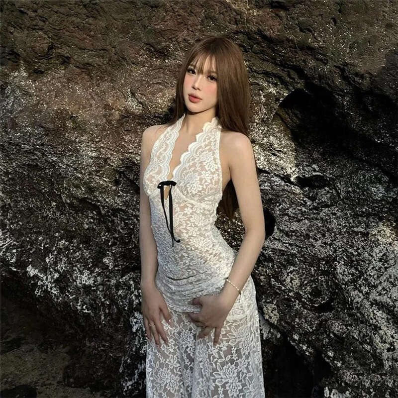 Wind 2024 autumn new women's clothing elegant white lace sleeveless top tassel slim fit short skirt
