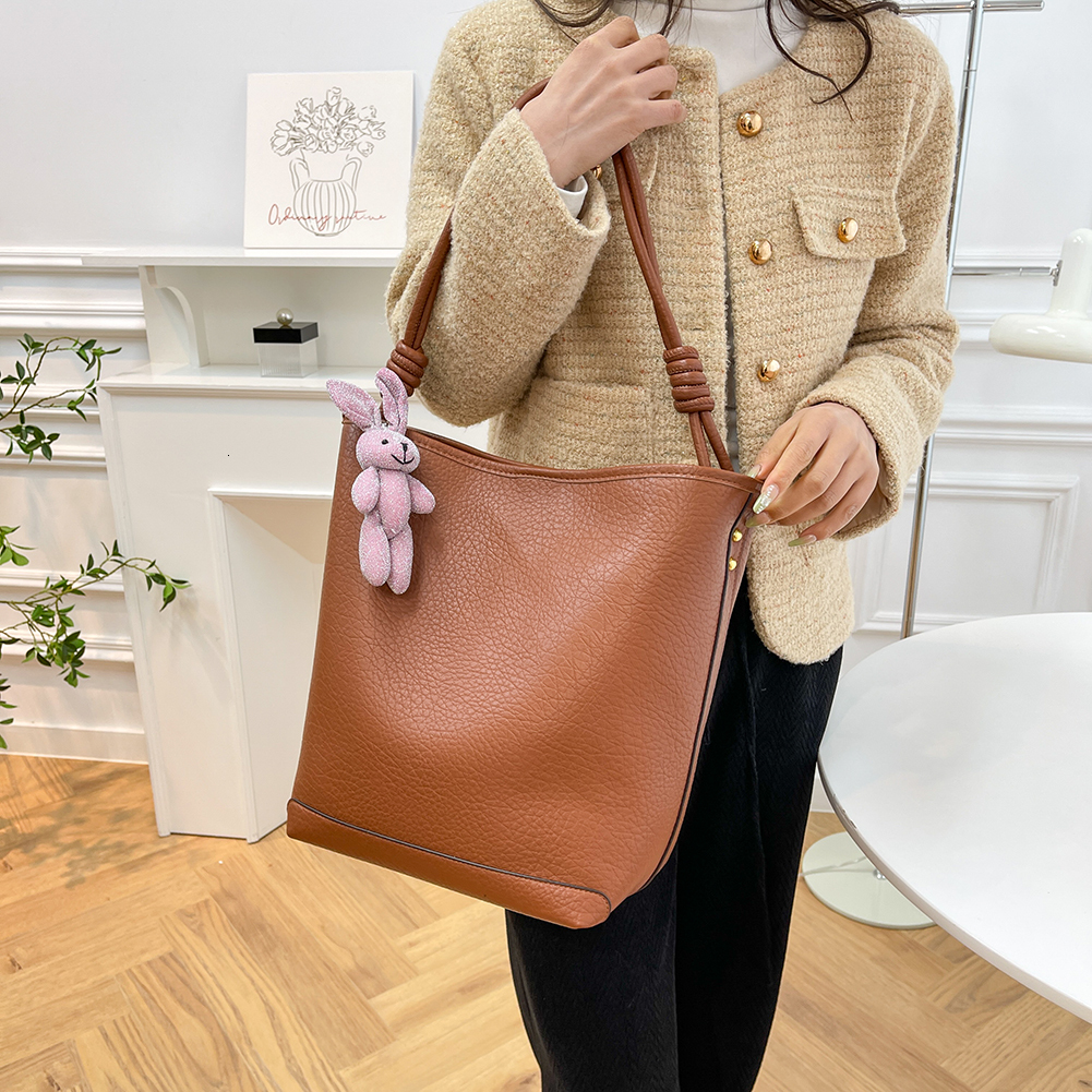 High Quality Shoulder With Rabbit Pendant Ladies PU Leather Bucket Solid Commuter Handbags Large Capacity Women Tote Bag