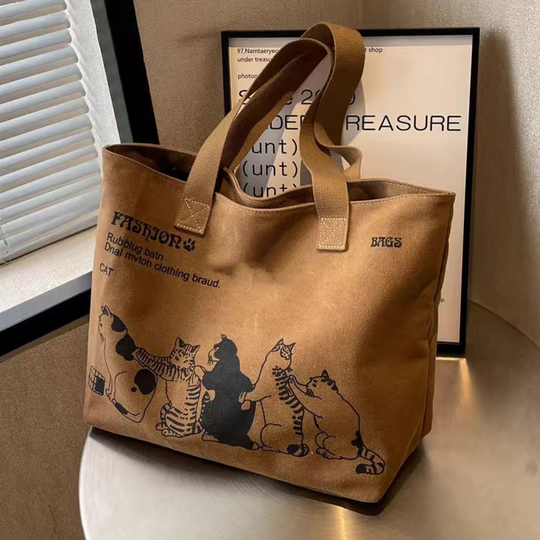 Large capacity canvas women in 2024, new single shoulder for mothers, student class tote bag