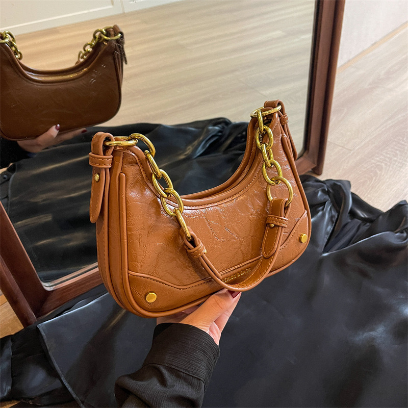 2024 new niche underarm spicy girl New style chain, single shoulder crossbody bag, women's fashionable texture dumpg bag