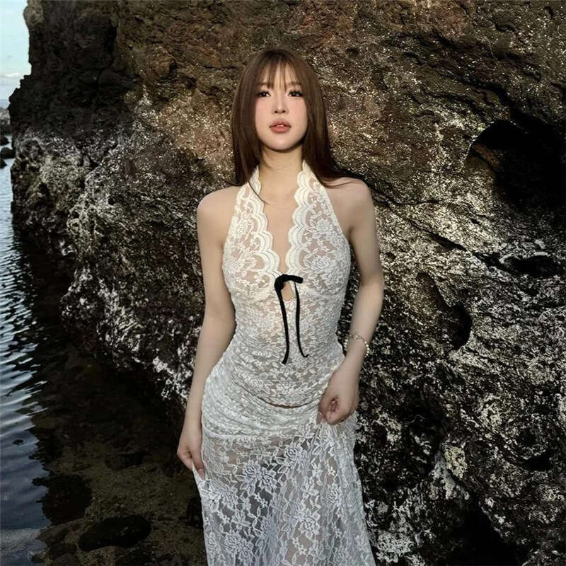 Wind 2024 autumn new women's clothing elegant white lace sleeveless top tassel slim fit short skirt