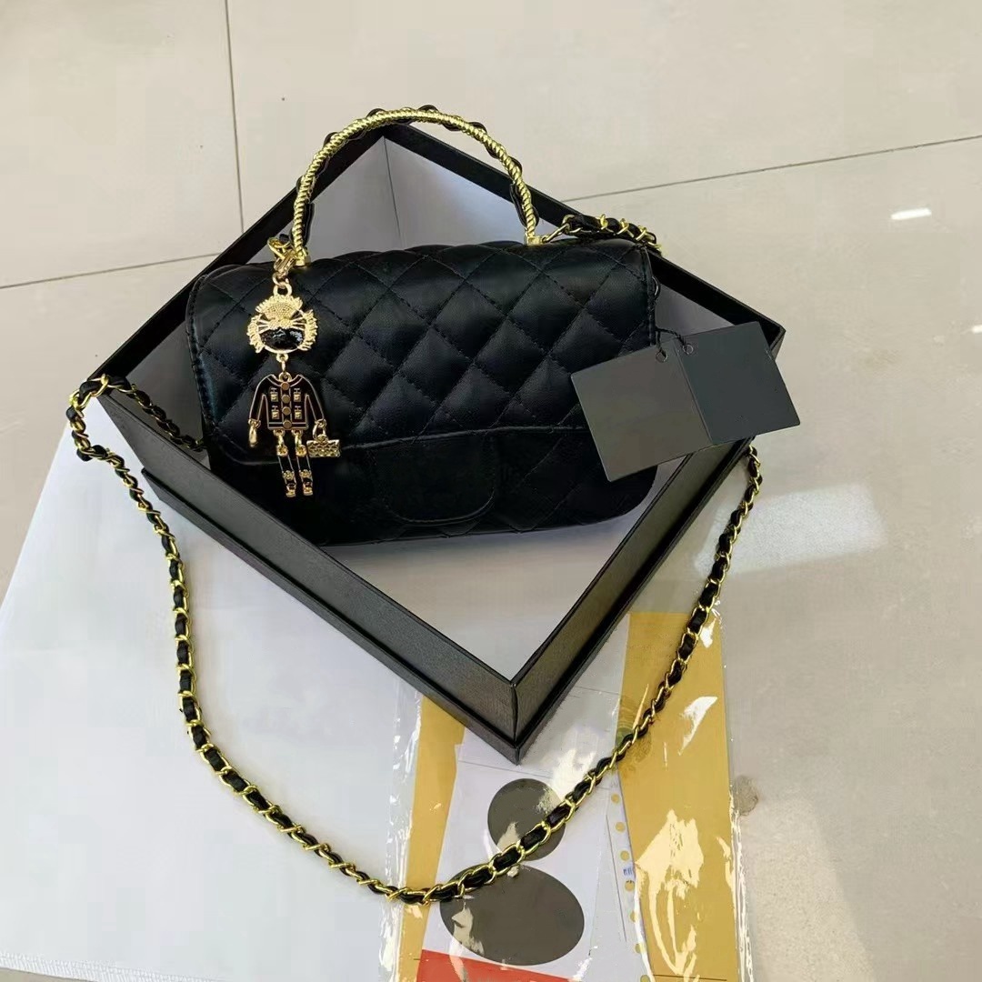 Designer ladies' fashionable luxury handbag classic flip chain shoulder bag with pendant gold and silver ball