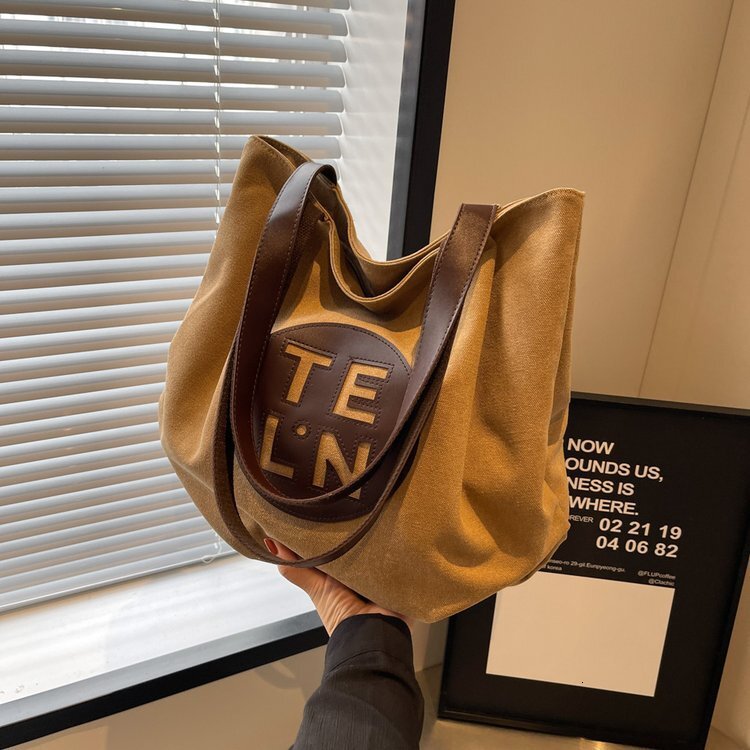 2025S designer lazy style canvas large capacity trendy fashion autumn and winter simple shoulder versatile women casual tote bag