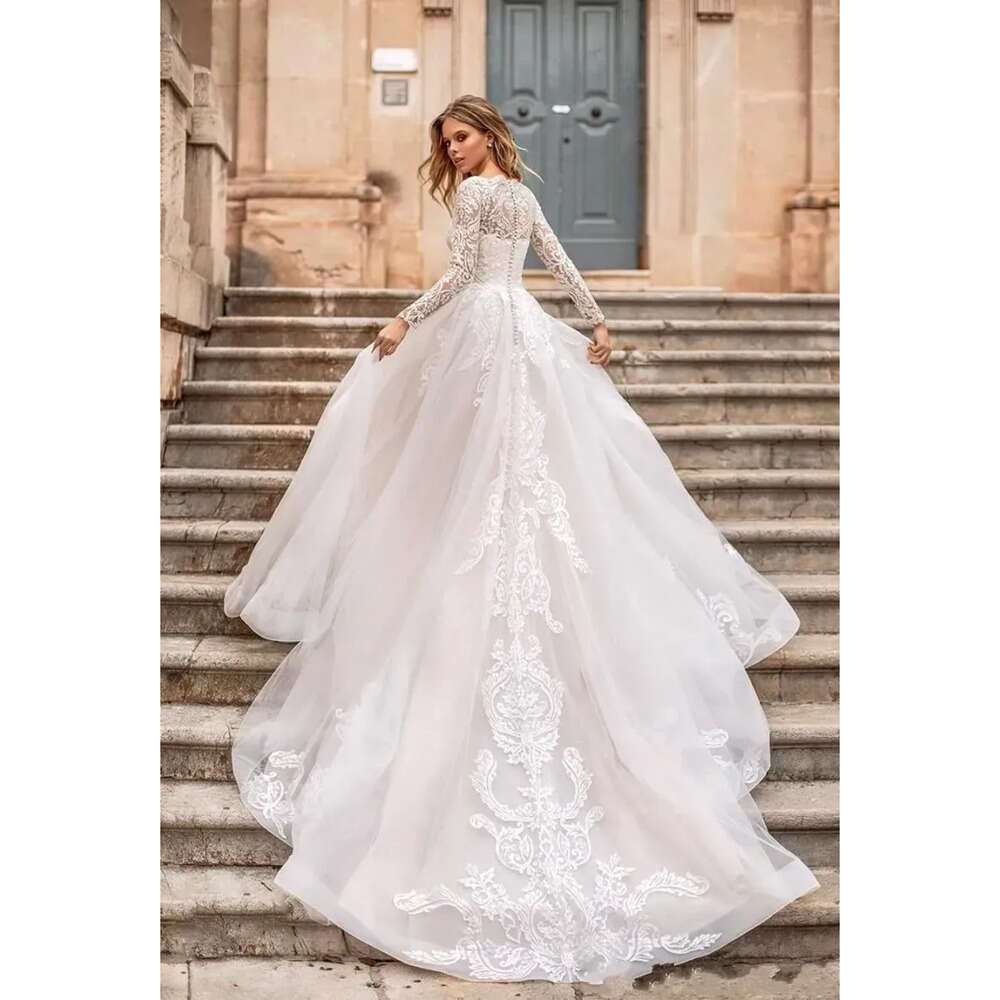 With Elegant A Line Tulle Gown Lace Appliques Sheer Long Sleevescourt Train Button Details Bridal Gowns Bc S