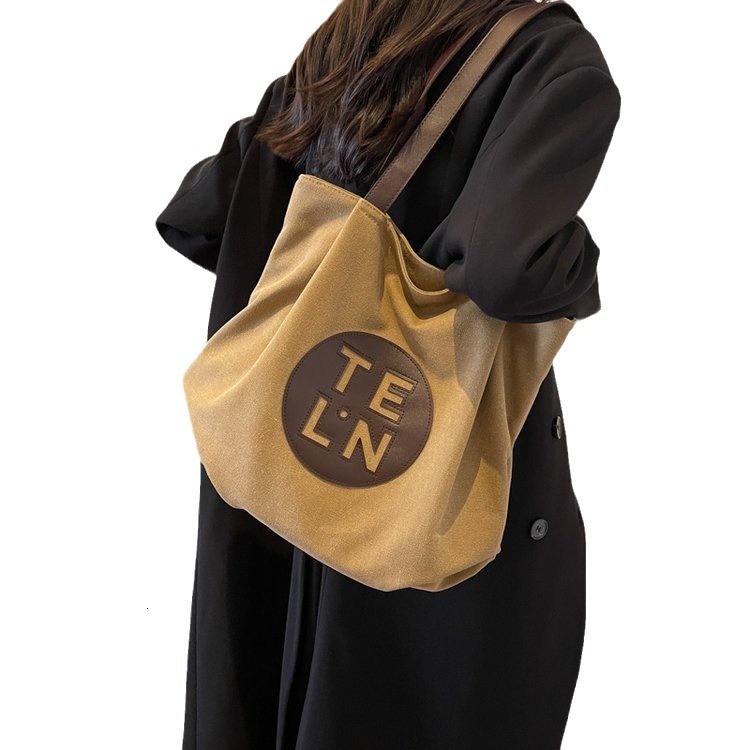 2025S designer lazy style canvas large capacity trendy fashion autumn and winter simple shoulder versatile women casual tote bag