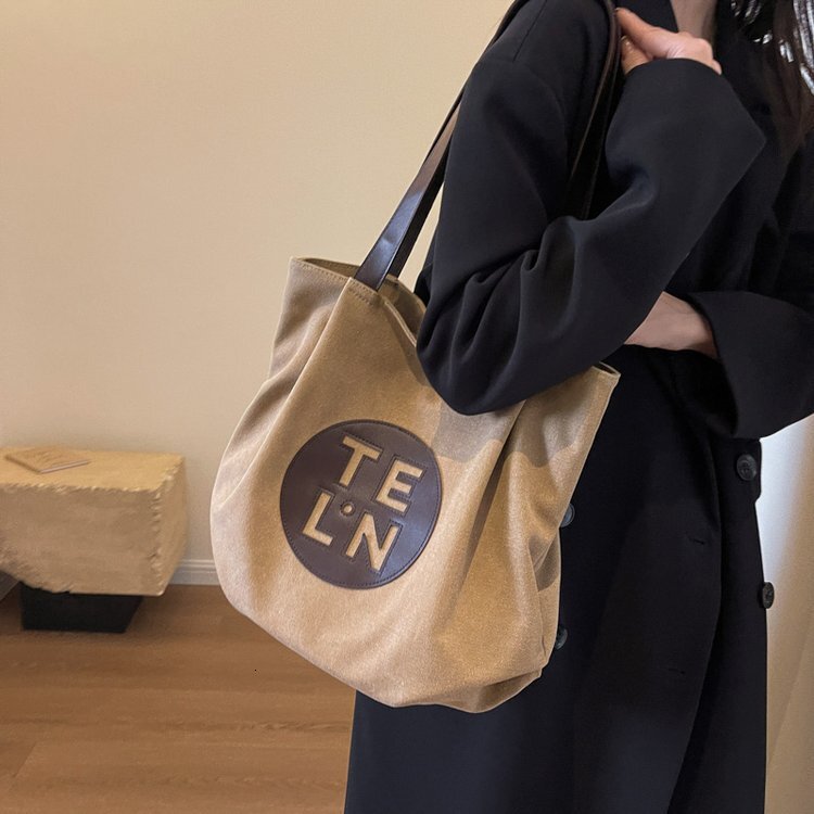 2025S designer lazy style canvas large capacity trendy fashion autumn and winter simple shoulder versatile women casual tote bag