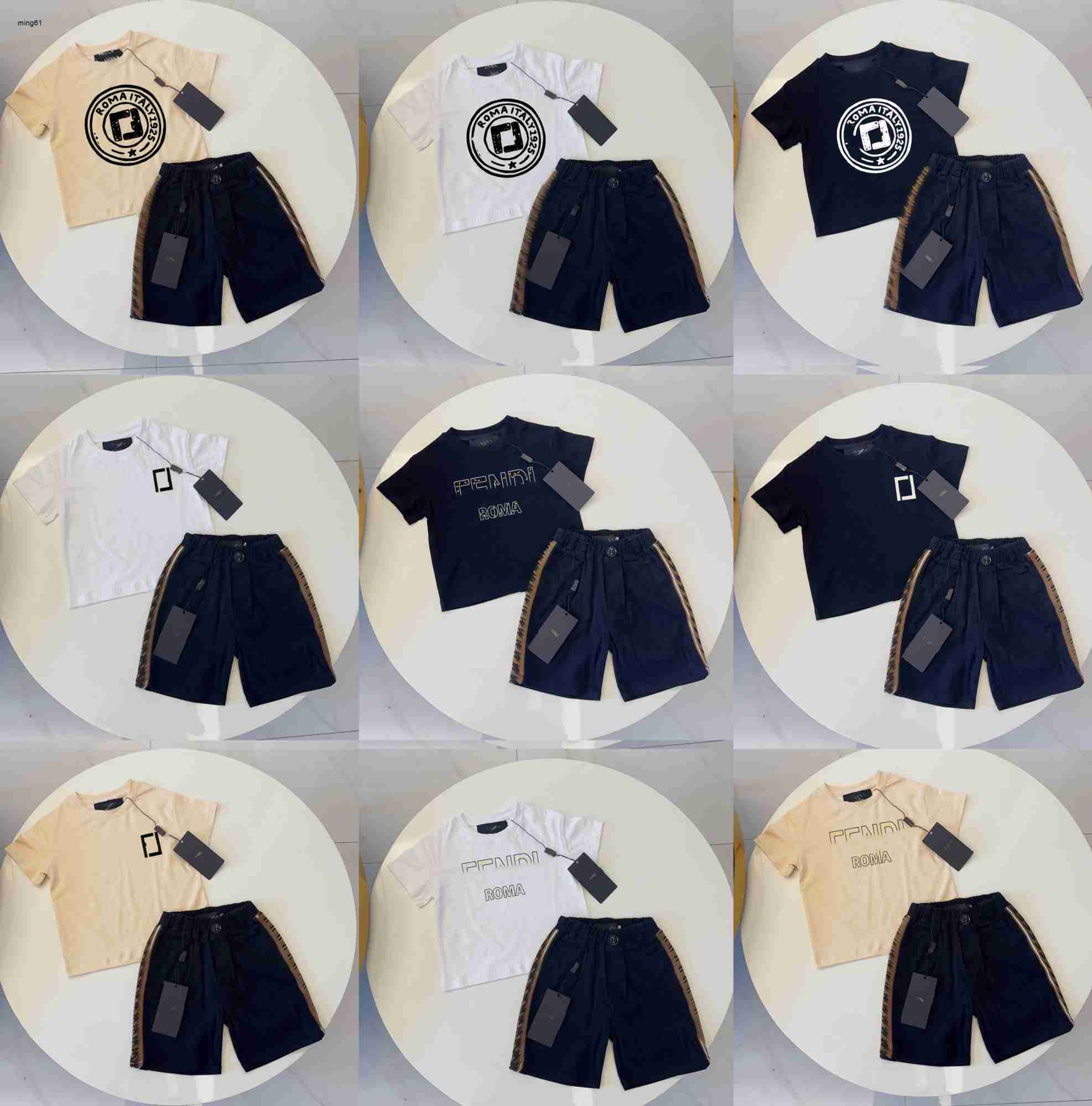 Brand kids T-shirts summer boys girls tracksuits Size 100-150 baby short sleeves and Grid letter printed shorts Jan20