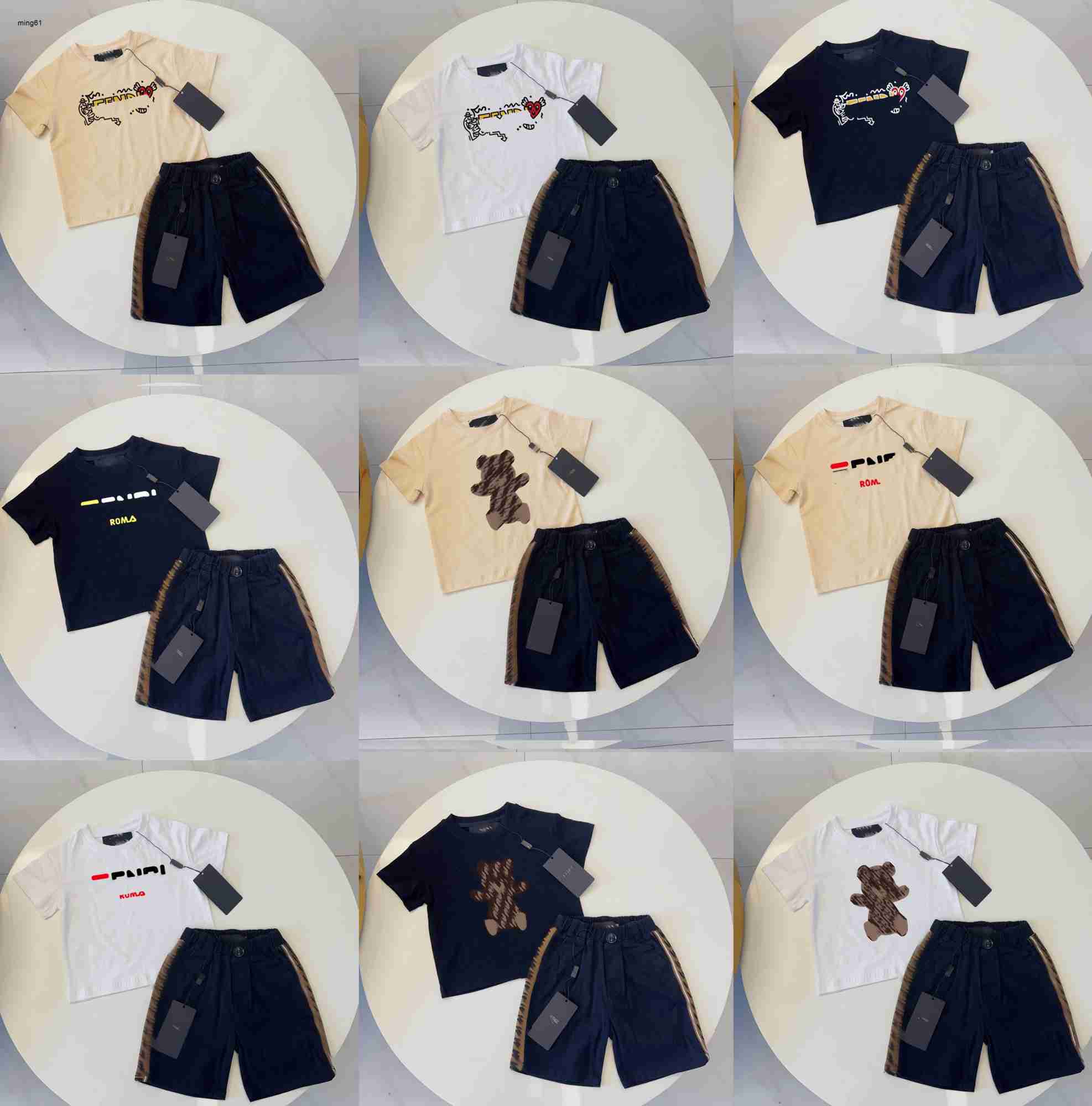Brand kids T-shirts summer boys girls tracksuits Size 100-150 baby short sleeves and Grid letter printed shorts Jan20
