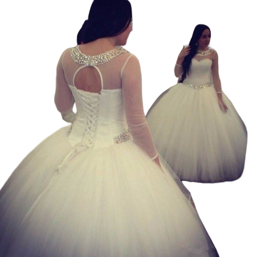 2023 Vintage Arabic Ball Gown Wedding Dresses Jewel Neck Illusion Long Sleeves Tulle Crystal Beaded Plus Size Formal Bridal Gowns Hollow Back Floor Le