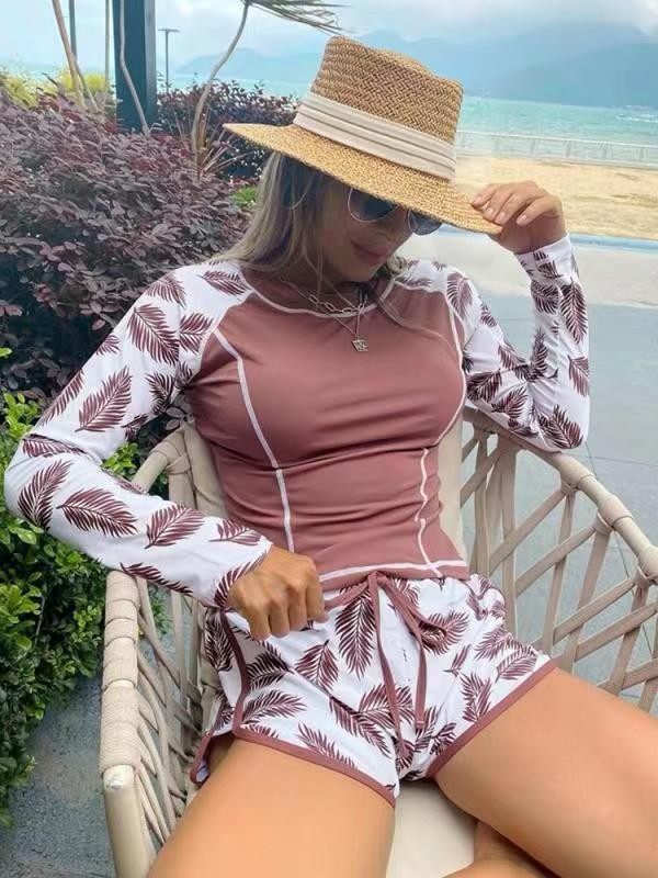 2024 Sexy Womens New European and American Surfing Suit Long sleeved Anti Diving Suit Printed Flat Angle Split Conservative Swimwear for Women