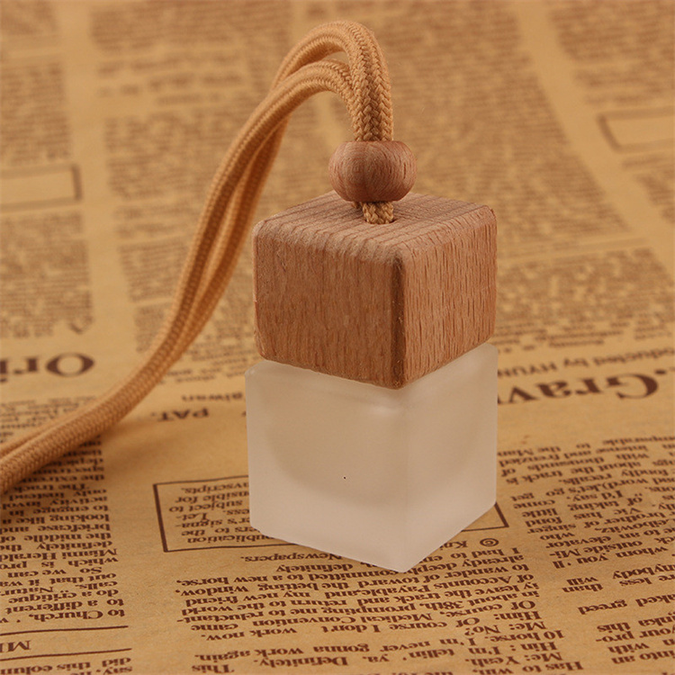 Wholesale Hanging Car Aroma Diffuser 8ml Air Freshener Cube Frosted Car Hanging Perfume Bottle With Wood Cap