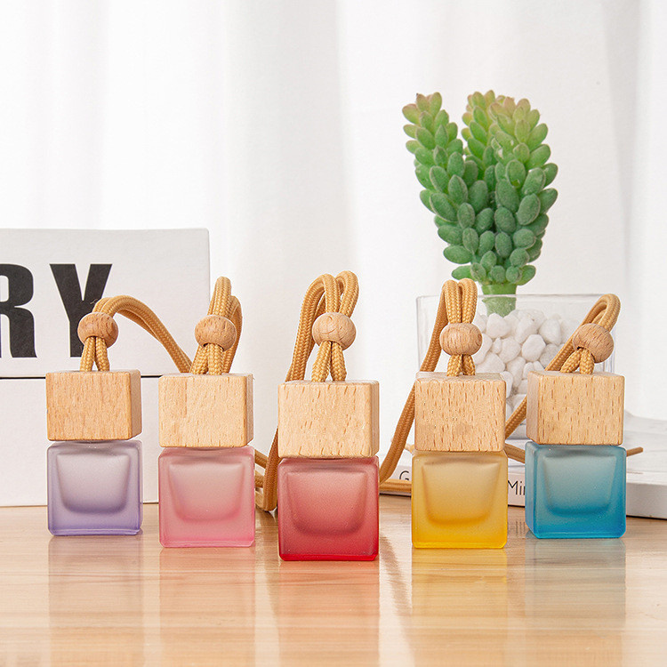 Wholesale Hanging Car Aroma Diffuser 8ml Air Freshener Cube Frosted Car Hanging Perfume Bottle With Wood Cap