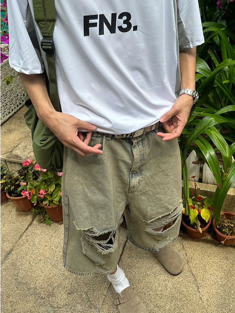 Hip Hop 2024 Hollow Hole Loose Jeans Shorts Streetwear Summer Fashion Ripped Denim Pant Men Clothing Solid Color Male Trousers 240530