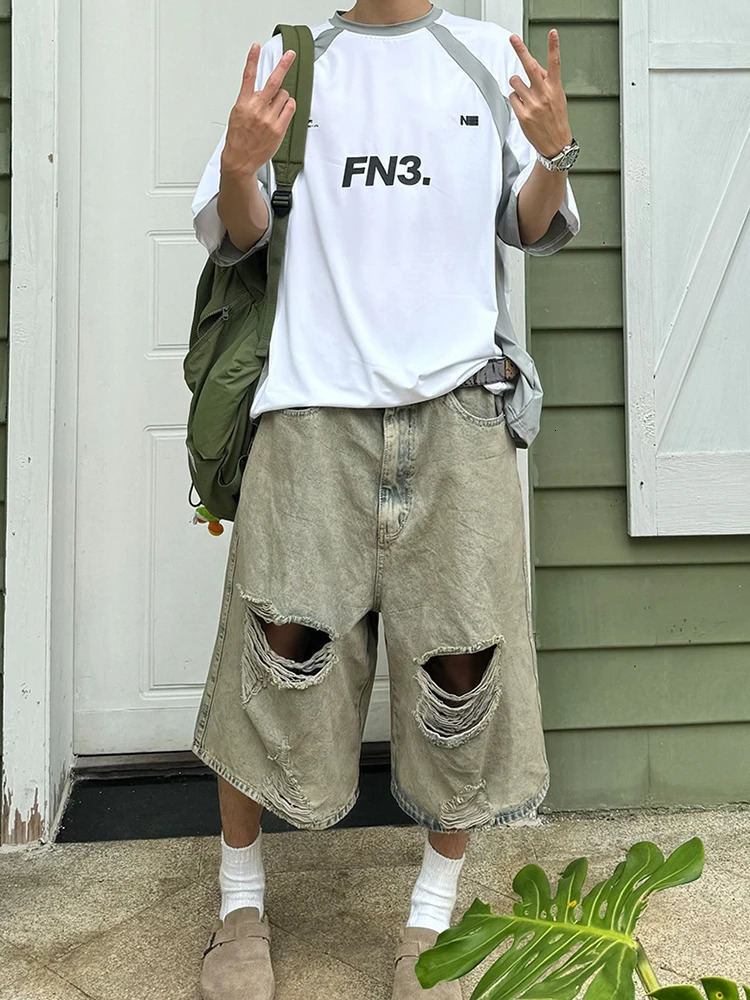 Hip Hop 2024 Hollow Hole Loose Jeans Shorts Streetwear Summer Fashion Ripped Denim Pant Men Clothing Solid Color Male Trousers 240530