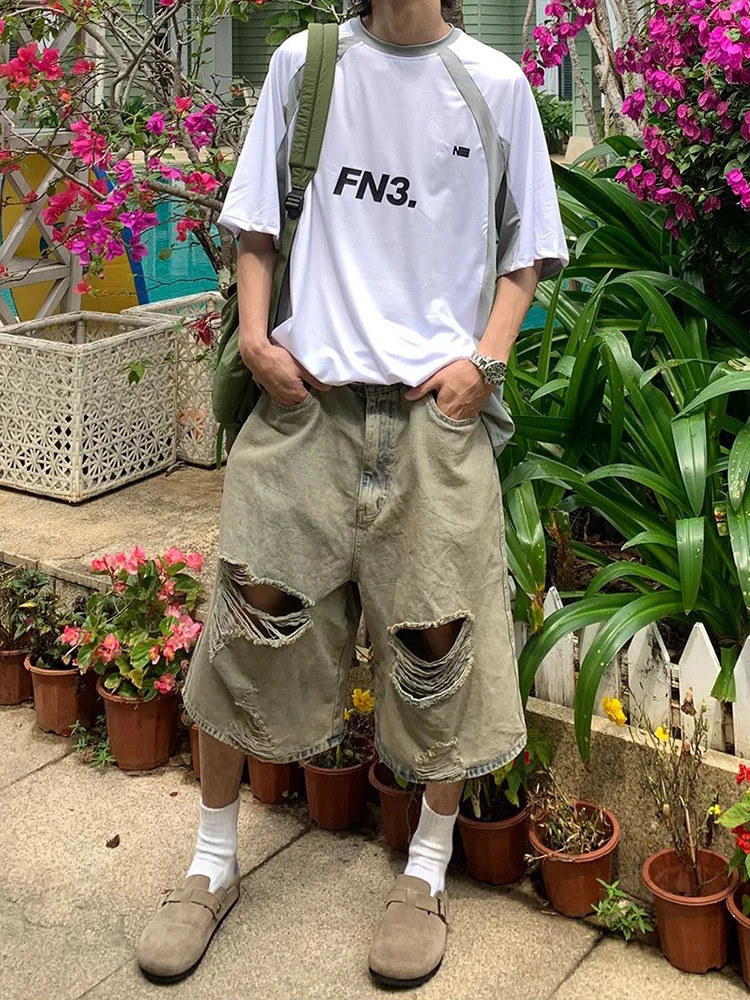 Hip Hop 2024 Hollow Hole Loose Jeans Shorts Streetwear Summer Fashion Ripped Denim Pant Men Clothing Solid Color Male Trousers 240530