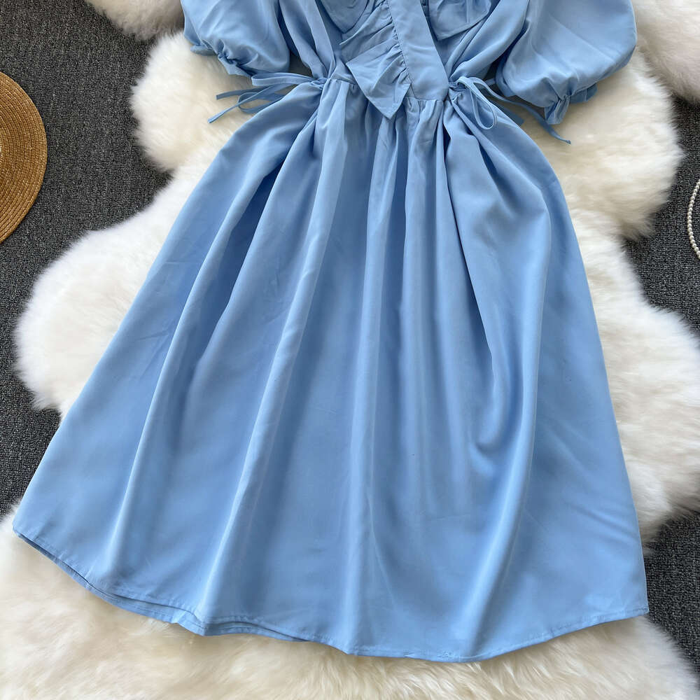 Korean style dress with sweet ruffled edges and V-neck straps for slimming waist and reducing age. New style for womens spring wear with bubble sleeve