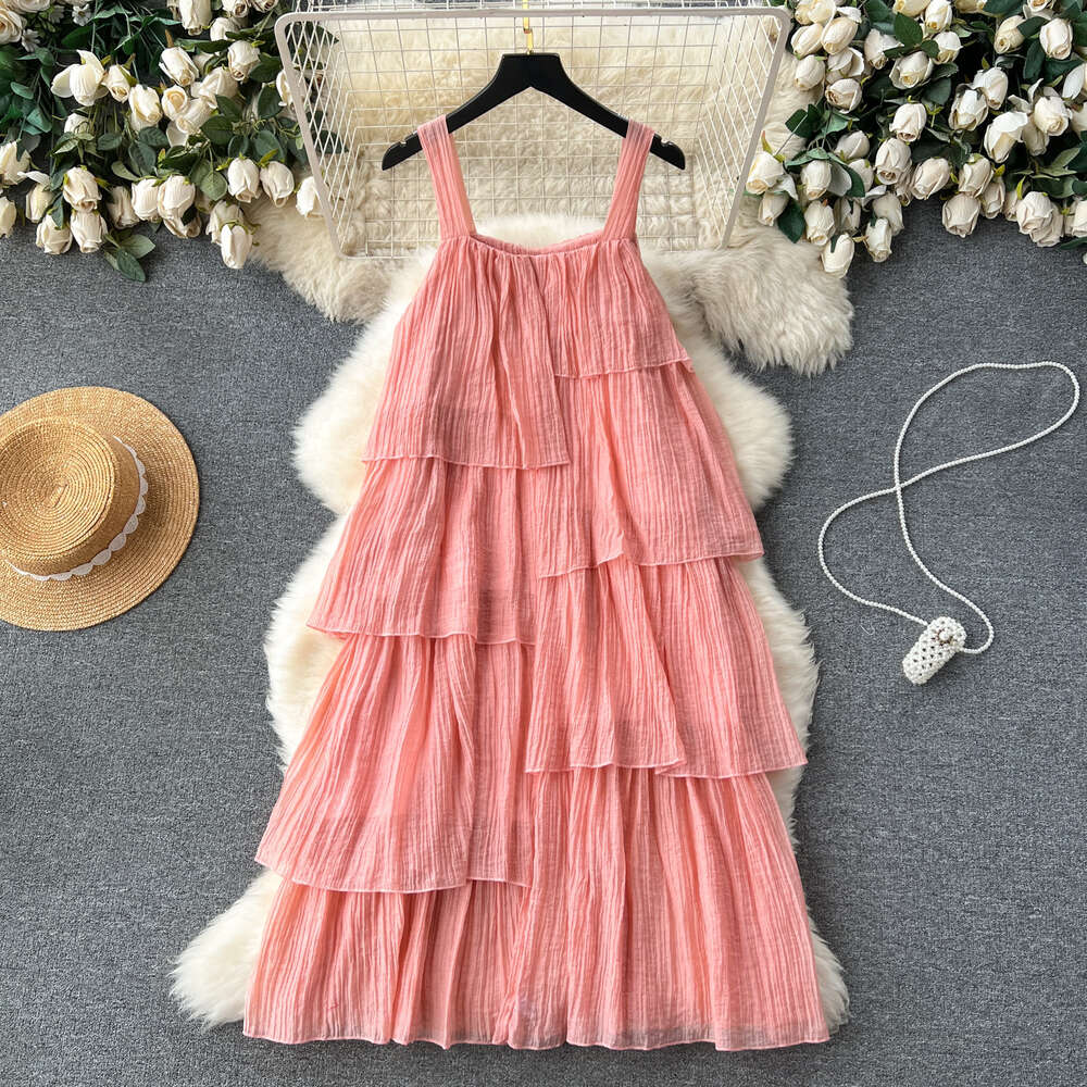 Korean holiday wear with a lazy design and irregular ruffled edges loose and slimming mid length suspender dress