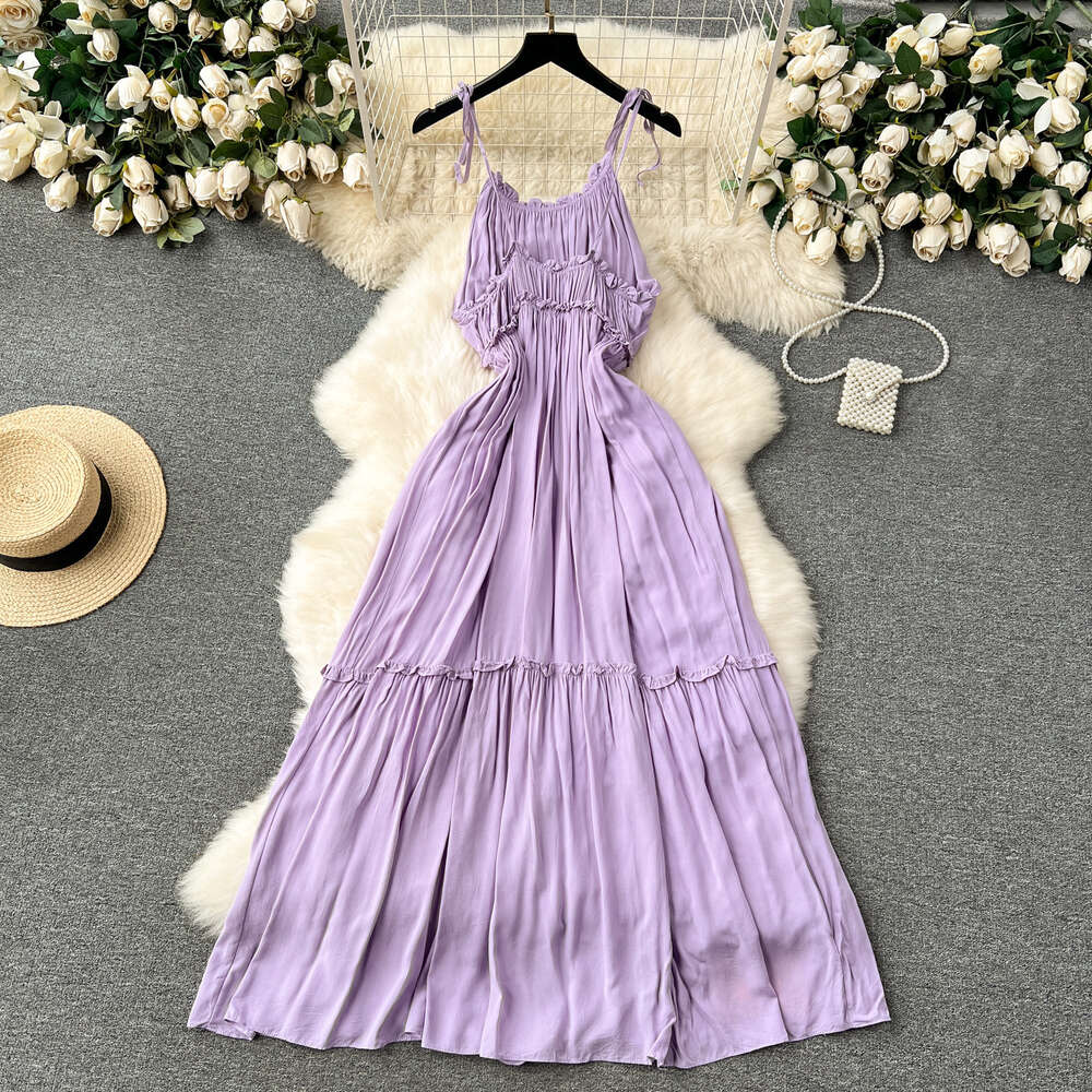 Purple dress for women in summer 2024 new seaside vacation travel photo taking and wearing high-end camisole fairy dress