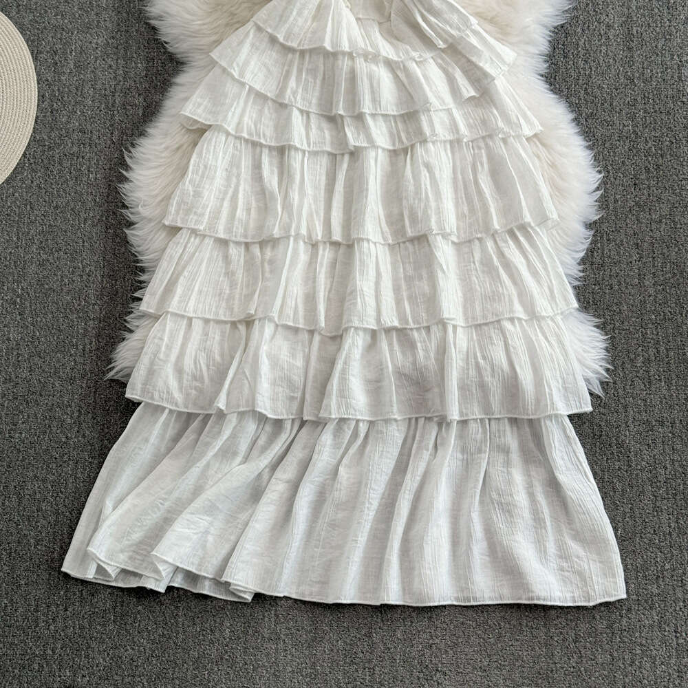 Fashionable and high-end socialite temperament hanging neck off shoulder waist slimming off medium length A-line ruffled edge cake dress