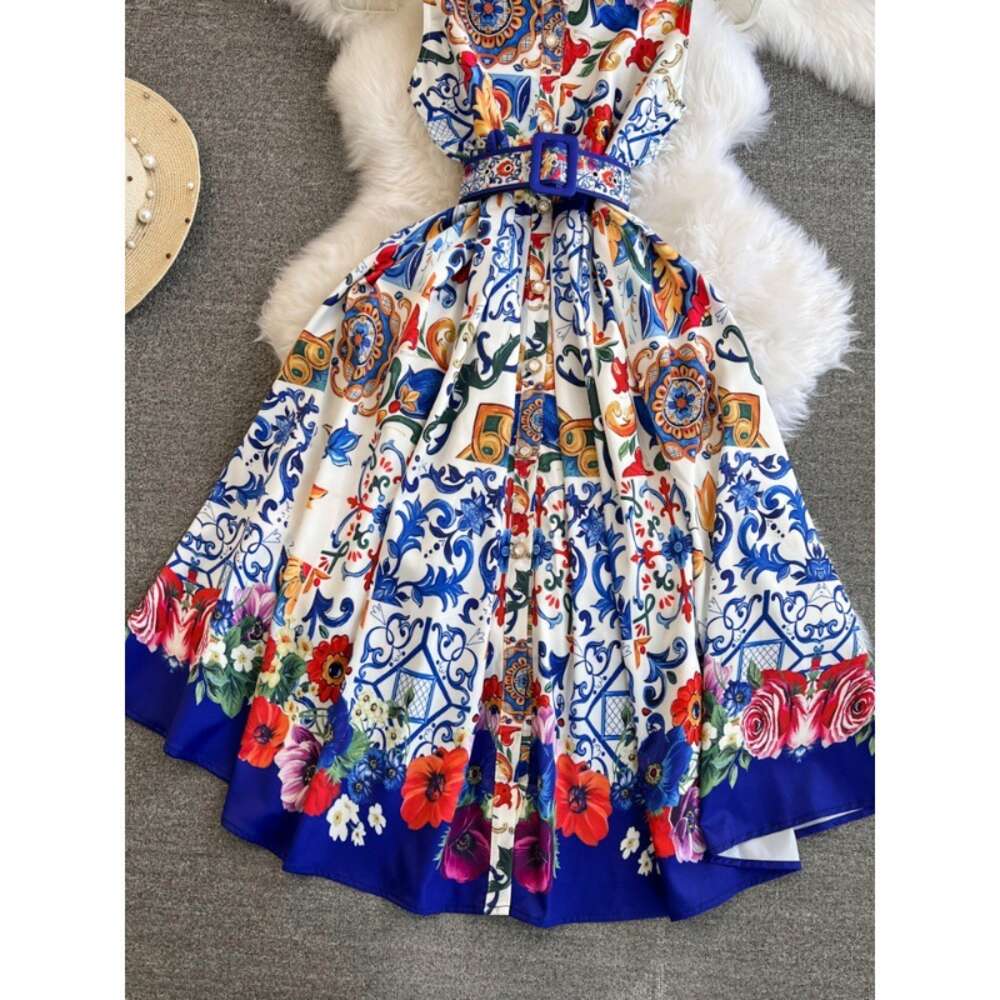 High end light luxury socialite temperament sleeveless V-neck waistband slimming effect mid length version A-line positioning printed dress dress