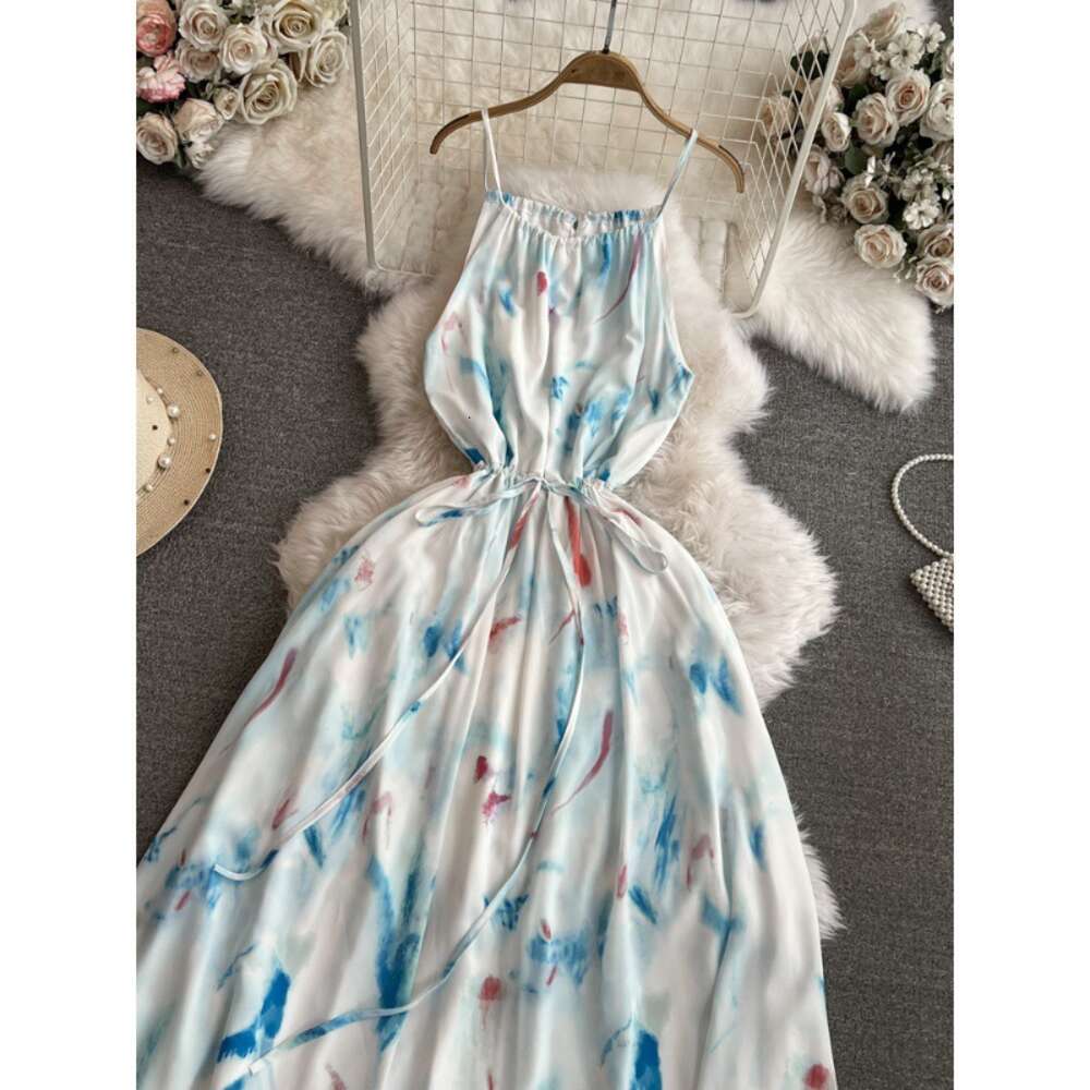 Gentle and socialite temperament slim waist mid length A-line printed strap dress seaside vacation beach skirt