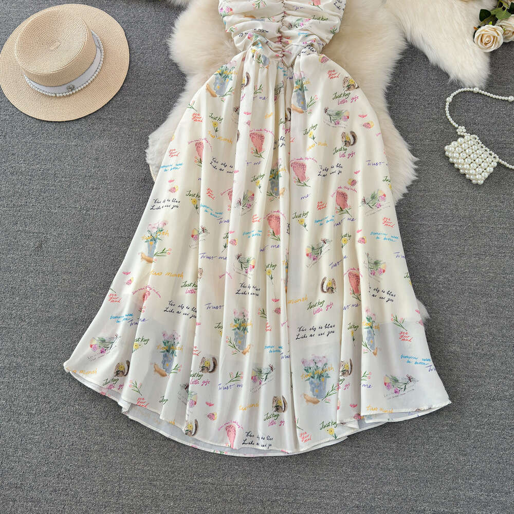 Beach resort style V-neck waist slimming mid length A-line suspender dress fashionable and elegant temperament long skirt in summer