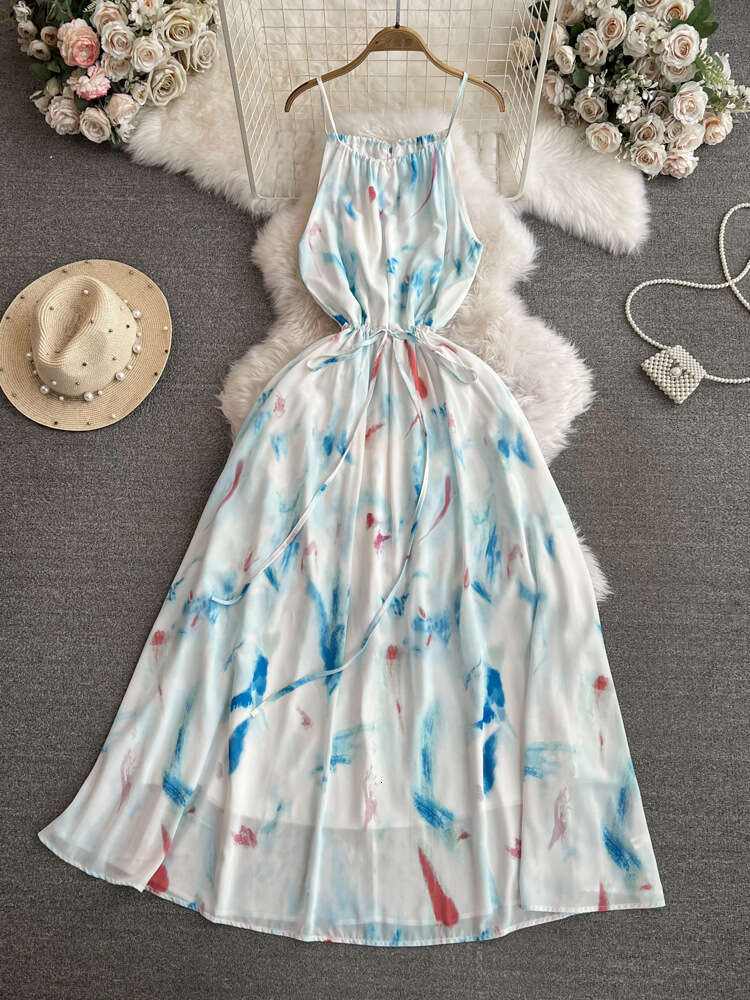 Gentle and socialite temperament slim waist mid length A-line printed strap dress seaside vacation beach skirt