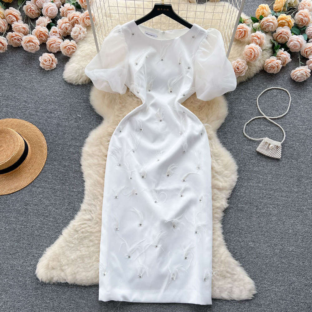 French haute couture heavy work nail diamond feather tassel round neck dress for women to show slimming temperament bubble sleeve dress long skirt