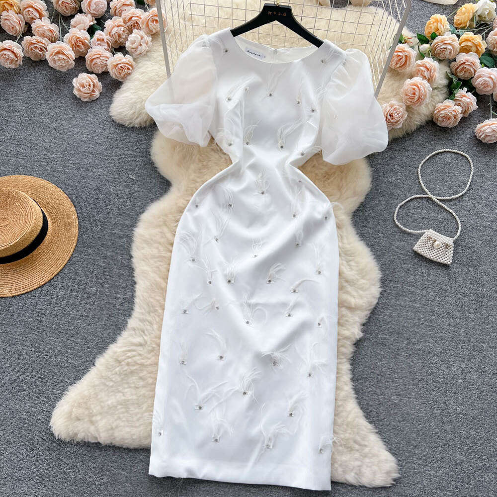 French haute couture heavy work nail diamond feather tassel round neck dress for women to show slimming temperament bubble sleeve dress long skirt