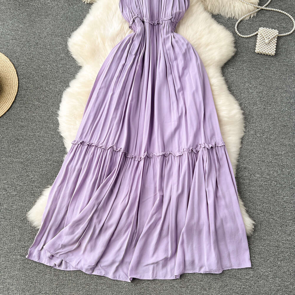 Purple dress for women in summer 2024 new seaside vacation travel photo taking and wearing high-end camisole fairy dress
