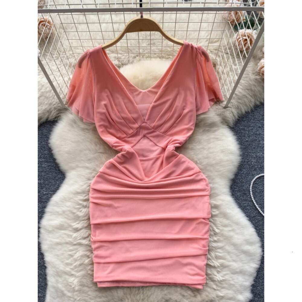 Nightclub womens clothing design sense dress female mind machine perspective hollowed out pleated slim fit short sexy buttocks wrapped skirt trend